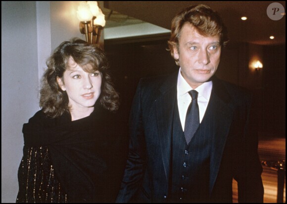 Nathalie Baye et Johnny Hallyday à l'avant-première de Thierry Le Luron, à Paris, le 27 janvier 1983.