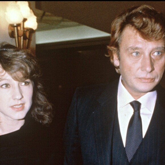 Nathalie Baye et Johnny Hallyday à l'avant-première de Thierry Le Luron, à Paris, le 27 janvier 1983.