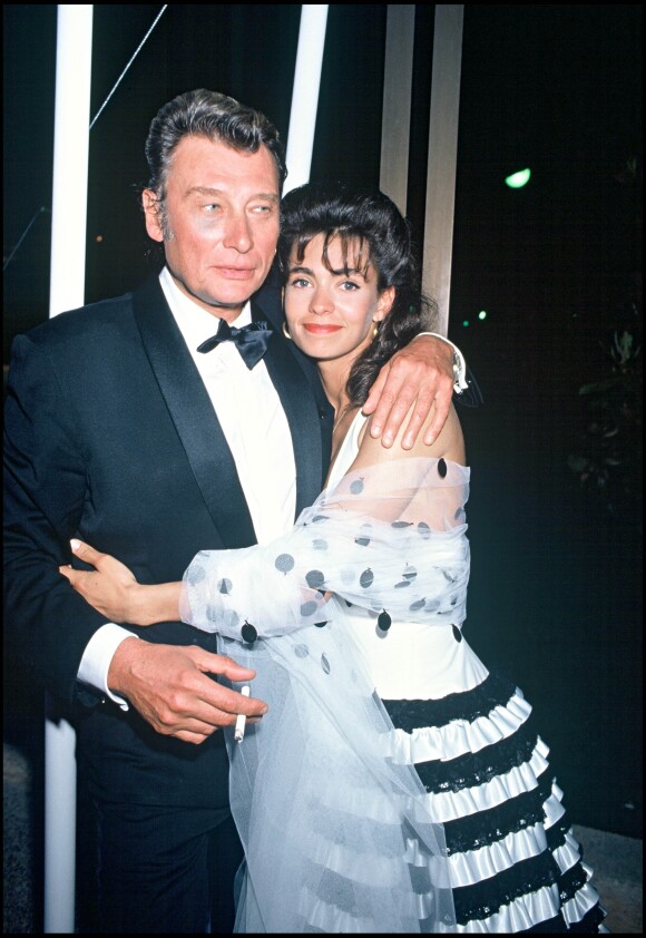 Johnny Hallyday et Adeline Blondieau au Festival de Cannes le 9 mai 1990.