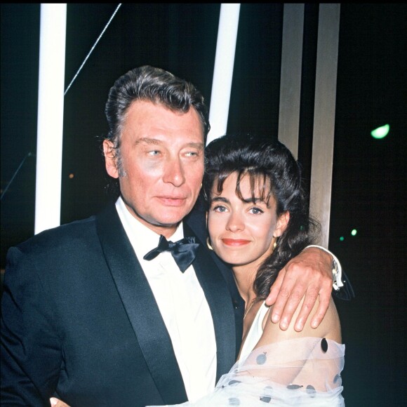 Johnny Hallyday et Adeline Blondieau au Festival de Cannes le 9 mai 1990.