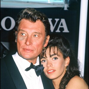 Johnny Hallyday et Adeline Blondieau au Festival de Cannes le 9 mai 1990.