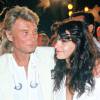 Johnny Hallyday et Adeline Blondieau à Saint-Tropez, le 27 juillet 1991.