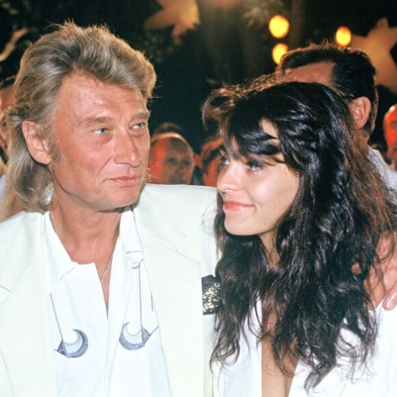 Johnny Hallyday et Adeline Blondieau à Saint-Tropez, le 27 juillet 1991.