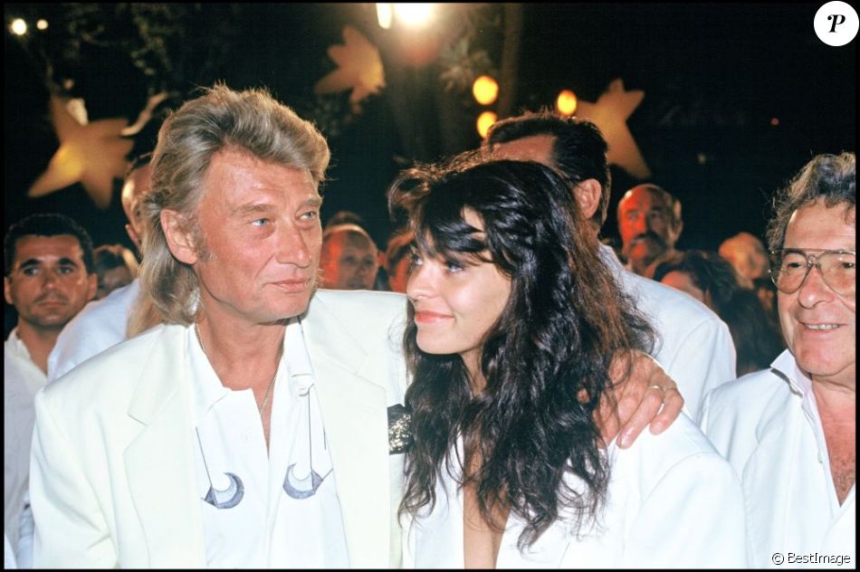 Johnny Hallyday et Adeline Blondieau à SaintTropez, le 27 juillet 1991