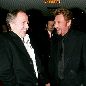 Johnny Hallyday et Fabrice Luchini à Paris en mars 2006.