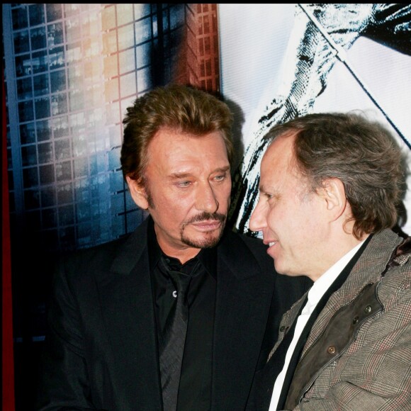 Johnny Hallyday et Fabrice Luchini lors de la première de Jean-Philippe à Paris en mars 2006.