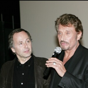 Johnny Hallyday et Fabrice Luchini à Paris en avril 2006.