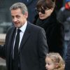 Carla Bruni et Nicolas Sarkozy avec leur fille Giulia aux obsèques d'Andrée Sarkozy, dite Dadue et née Andrée Mallah, en l'église Saint-Jean-Baptiste à Neuilly-Sur-Seine. Le 18 décembre 2017 