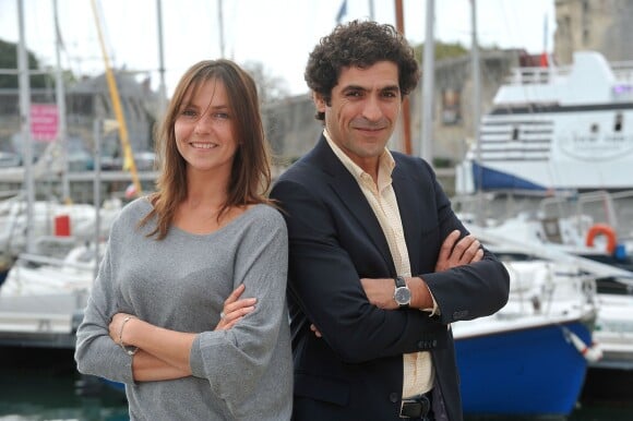Abdelhafid Metalsi et Carole Bianic posent pour le photocall de la serie ' Cherif ' durant le 15e Festival de la Fiction Tv de La Rochelle le 13 septembre 2013.