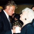Archives - Johnny Hallyday et Line Renaud en 1997. Le chanteur recevait la Légion d'honneur à Paris.