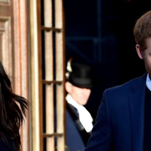 Le prince Harry et Meghan Markle lors d'une réception pour les jeunes au palais de Holyroodhouse à Edimbourg, en Ecosse, le 13 février 2018.