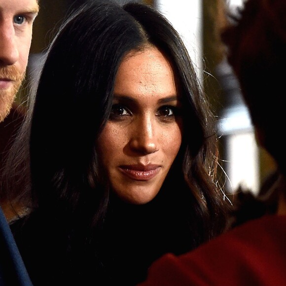 Le prince Harry et Meghan Markle lors d'une réception pour les jeunes au palais de Holyroodhouse à Edimbourg, en Ecosse, le 13 février 2018.