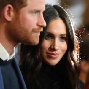 Le prince Harry et Meghan Markle lors d'une réception pour les jeunes au palais de Holyroodhouse à Edimbourg, en Ecosse, le 13 février 2018.