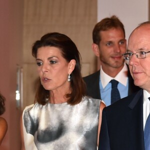La princesse Stéphanie de Monaco, son frère, le prince Albert II de Monaco et la princesse Caroline de Hanovre lors du traditionnel gala au profit de l'association Fight Aids Monaco, présidée par la princesse Stéphanie de Monaco à la salle des Etoiles au Sporting de Monaco à Mont-Carlo, le 10 Juillet 2015.