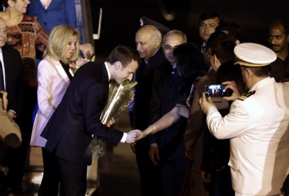 Jean-Yves Le Drian, ministre de l'Europe et des affaires étrangères, Le président Emmanuel Macron, La première dame Brigitte Macron lors de l’arrivée du couple présidentiel français à l'aéroport militaire de Delhi le 9 mars 2018. Le président français et son épouse sont en voyage officiel en Inde pour 3 jours. © Dominique Jacovides / Bestimage