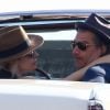 Exclusif - Lady Gaga et son compagnon Christian Carino s'embrassent tendrement dans leur voiture ancienne décapotable à Malibu, le 11 mars 2018.