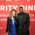 Djibril Cissé et une invitée - Dîner de charité pour la fondation Samuel Eto'o au Petit Palais à Paris, France, le 5 avril 2018. © Tiziano da Silva/Bestimage