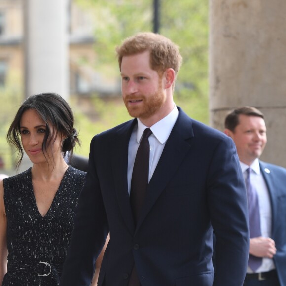 Le prince Harry et Meghan Markle le 23 avril 2018 en l'église St Martin-in-the-fileds à Londres pour la cérémonie commémorant le 25e anniversaire de l'assassinat de Stephen Lawrence, victime à 18 ans d'un crime raciste.