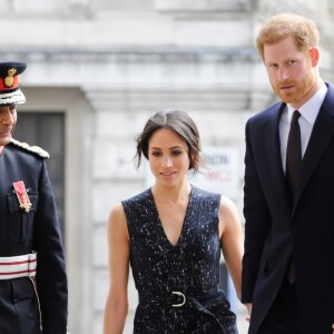 Le prince Harry et Meghan Markle le 23 avril 2018 en l'église St Martin-in-the-fileds à Londres pour la cérémonie commémorant le 25e anniversaire de l'assassinat de Stephen Lawrence, victime à 18 ans d'un crime raciste.