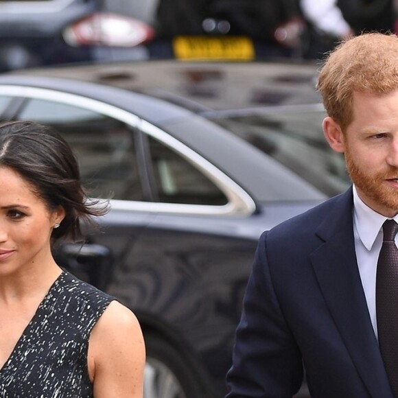 Le prince Harry et Meghan Markle à leur arrivée le 23 avril 2018 en l'église St Martin-in-the-fileds à Londres, à la cérémonie commémorant le 25e anniversaire de l'assassinat de Stephen Lawrence, victime à 18 ans d'un crime raciste.