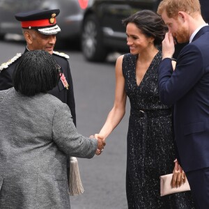 Le prince Harry et Meghan Markle à leur arrivée le 23 avril 2018 en l'église St Martin-in-the-fileds à Londres, à la cérémonie commémorant le 25e anniversaire de l'assassinat de Stephen Lawrence, victime à 18 ans d'un crime raciste.