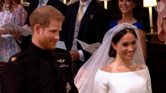 Mariage du prince Harry et de Meghan Markle le 19 mai 2018 en la chapelle St George à Windsor. Meghan porte une robe de mariée confectionnée par Clare Waight Keller pour Givenchy, Harry porte son uniforme de capitaine des Blues and Royals.