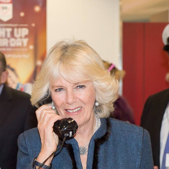 Barbara Windsor et Camilla Parker Bowles, duchesse de Cornouailles, lors de la journee de charité "ICAP fancy dress day" à Londres le 3 décembre 2013