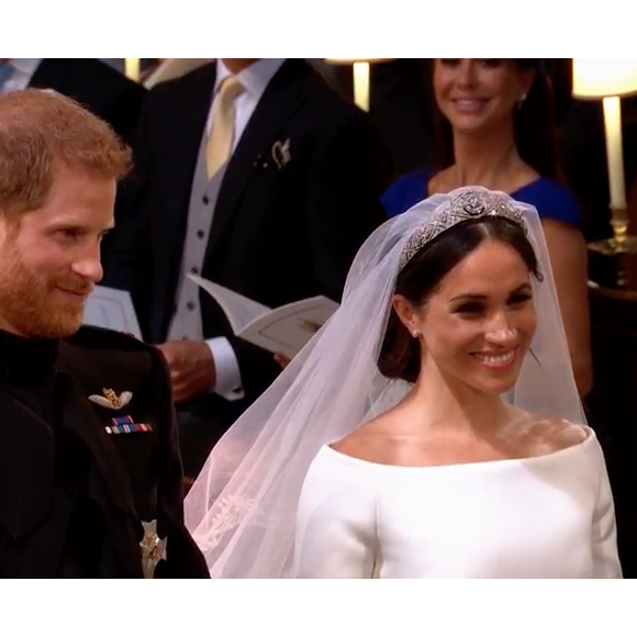 Mariage du prince Harry et de Meghan Markle le 19 mai 2018 en la chapelle St George à Windsor. Meghan porte une robe de mariée confectionnée par Clare Waight Keller pour Givenchy, Harry porte son uniforme de capitaine des Blues and Royals.