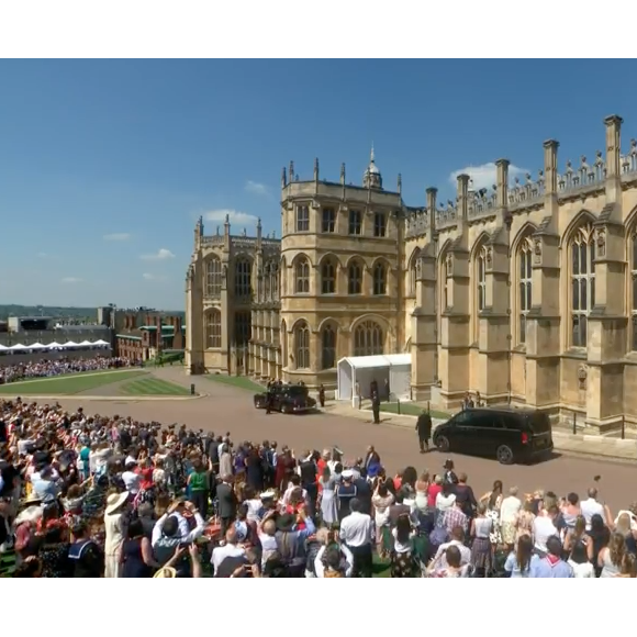 Mariage du prince Harry et de Meghan Markle le 19 mai 2018 en la chapelle St George à Windsor. Meghan porte une robe de mariée confectionnée par Clare Waight Keller pour Givenchy, Harry porte son uniforme de capitaine des Blues and Royals.