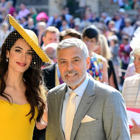 George Clooney et sa femme Amal - Les invités arrivent à la chapelle St. George pour le mariage du prince Harry et de Meghan Markle au château de Windsor, Royaume Uni, le 19 mai 2018.