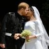 Le prince Harry, duc de Sussex, et Meghan Markle, duchesse de Sussex, à la sortie de chapelle St. George au château de Windsor après la cérémonie de leur mariage, le 19 mai 2018.