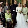 Le prince Harry et la duchesse Meghan de Sussex (Meghan Markle), photo officielle de leur mariage le 19 mai 2018 réalisée au château de Windsor par Alexi Lubomirski. Les jeunes mariés sont ici entourés de leur famille et de leurs enfants d'honneur : (debout, de g. à dr.) Jasper Dyer, la duchesse Camilla de Cornouailles, le prince Charles, Doria Ragland, le prince William ; (rangée centrale) Brian Mulroney, le duc d'Edimbourg, la reine Elizabeth II, la duchesse Catherine de Cambridge, la princesse Charlotte, le prince George, Rylan Litt, John Mulroney ; (au sol) Ivy Mulroney, Florence van Cutsem, Zalie Warren, Remi Litt. ©Alexi Lubomirski/PA Wire/Abacapress.com