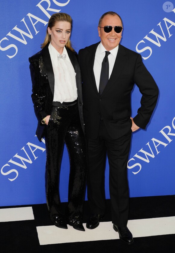 Amber Heard et Michael Kors assistent aux CFDA Awards 2018 au Brooklyn Museum à New York, le 4 juin 2018.