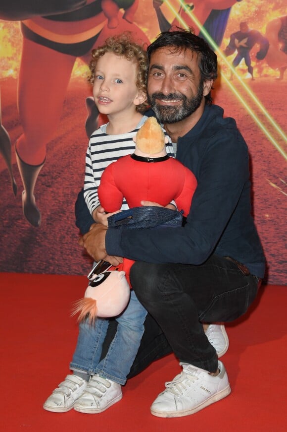 Olivier Benkemoun avec son fils - Avant-première du film "Les indestructibles 2" au cinéma le Grand Rex à Paris le 17 juin 2018. © Coadic Guirec/Bestimage