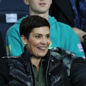 Cristina Cordula et son mari Frédéric Cassin dans les tribunes du match de football de Ligue 1 PSG - Monaco au Parc des Princes à Paris, le 15 avril 2018.