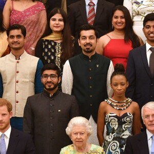 Le prince Harry, duc de Sussex, et Meghan Markle, duchesse de Sussex, au palais de Buckingham à Londres le 26 juin 2018 pour la réception des Queen's Young Leaders Awards.