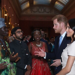 Le prince Harry, duc de Sussex, et Meghan Markle, duchesse de Sussex, au palais de Buckingham à Londres le 26 juin 2018 pour la réception des Queen's Young Leaders Awards.