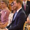 Le prince Harry, duc de Sussex, et Meghan Markle, duchesse de Sussex, au palais de Buckingham à Londres le 26 juin 2018 pour la réception des Queen's Young Leaders Awards.