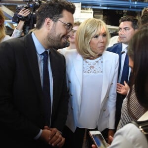 Mounir Mahjoubi, secrétaire d'Etat, chargé du Numérique et la Première Dame Brigitte Macron (Trogneux) - La Première Dame française assiste au lancement de la fondation Femmes@Numérique pour rééquilibrer la répartition hommes-femmes dans les entreprises des nouvelles technologies à la cité des sciences et de l'industrie à Paris, France, le 27 juin 2018. La Première Dame est venue à la réception et a rencontré plusieurs associations dont elle a salué les "belles initiatives". © Giancarlo Gorassini/Bestimage