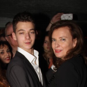 Exclusif - Valérie Trierweiler et son fils Léonard - Valérie Trierweiler fête son 50ème anniversaire en présence de sa mère, son frère, son fils et son ex mari au Banana Café à Paris le 20 février 2015.