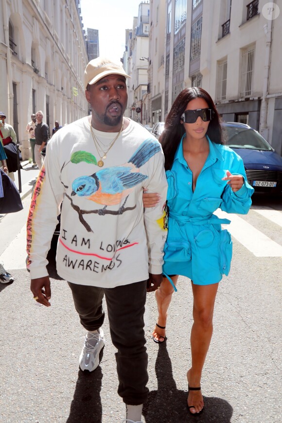Kim Kardashian et son mari Kanye West arrivent au défilé de mode Homme printemps-été 2019 " Louis Vuitton" à Paris. Le 21 juin 2018.