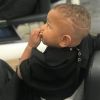 Tony Yoka publie une photo de son fils Ali après qu'il lui a rasé les cheveux. Instagram, le 25 juillet 2018.