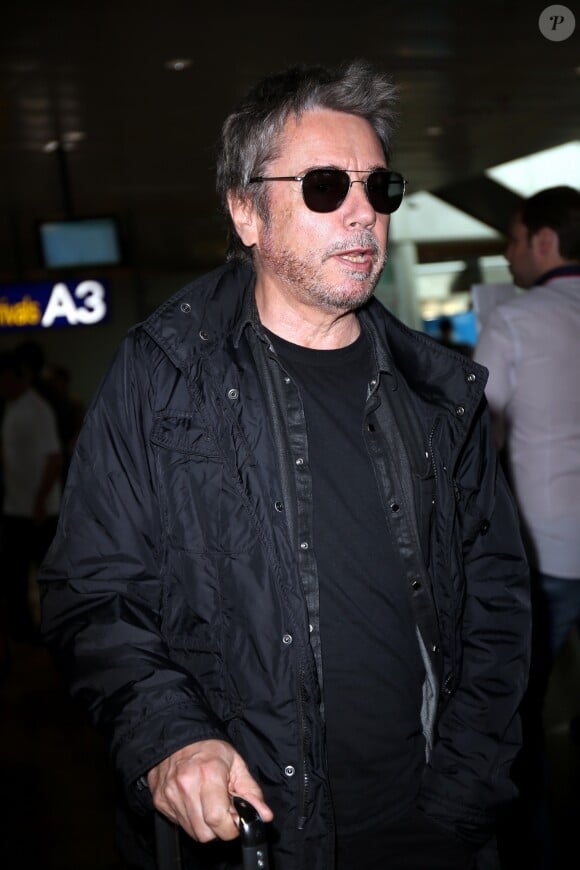 Jean Michel Jarre arrive à l'aéroport de Nice pour se rendre au 69ème festival international du film de Cannes le 13 mai 2016.
