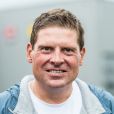 Former professional cyclist Jan Ullrich stands on the sidewalk and awaits with fans for the arrival of the peloton in Korschenbroich, Germany, during the Dusseldorf-Luttich stretch, the 2nd stage of the Tour de France, part of the UCI World Tour, 02 July 2017. Photo: Guido Kirchner/dpa02/07/2017 - Duesseldorf