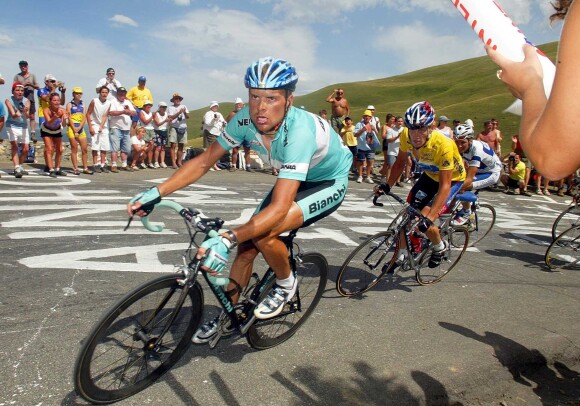 (dpa) - German Olympic winner Jan Ullrich (Team Bianchi) (R) cycles in front of US cyclist and front-runner Lance Armstrong (Team US Postal Service-Berry Floor) during the 14th leg of the Tour de France in Saint-Girons, France, 20 July 2003. In the end Armstrong, who comes in on 11th place, manages to assert his lead of 15 seconds against Ullrich who comes in on 12th place. The 14th leg covers a distance of 191,5 kilometres from the French town of Saint-Girons to Loudenvielle-Le Louron. It is the first of three legs which lead across the Pyrenees.20/07/2003 - Saint-Girons