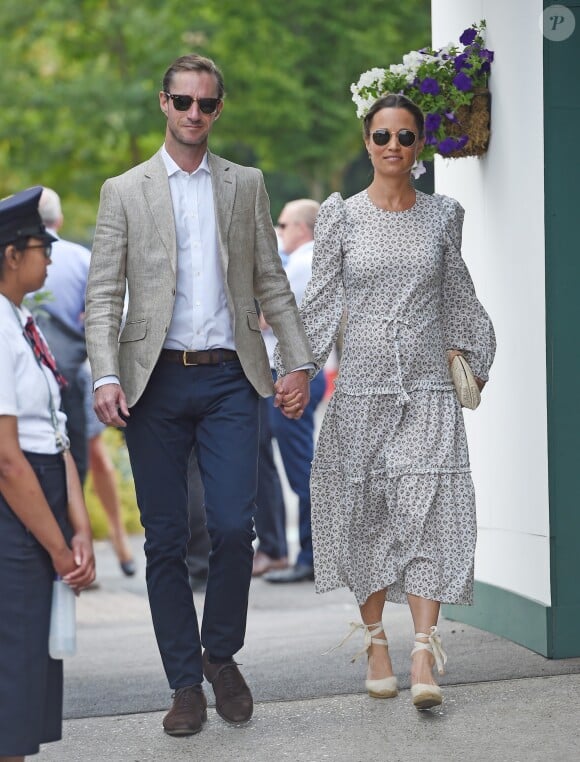 Pippa Middleton et son mari James Matthews à Wimbledon à Londres, le 13 juillet 2018.