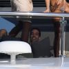 Exclusif - Emily Ratajkowski profite d'une belle journée ensoleillée sur un yacht avec ses amis Jordan Barrett et Mohamed Al Turki au large de Porto Cervo en Italie, le 11 août 2018.