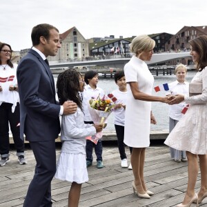 Le président Emmanuel Macron et sa épouse Brigitte Macron ont assisté à la réception de retour offerte en l'honneur de Sa Majesté la reine Margrethe II de Danemark sur le parvis du théâtre royal de Copenhague, le 29 août 2018.