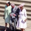 Doria Ragland, la mère de Meghan Markle, avec le prince Charles et la duchesse Camilla lors du mariage de Meghan et du prince Harry le 19 mai 2018 à Windsor.