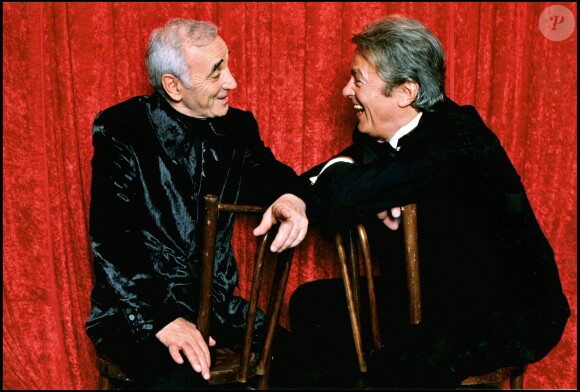 ARCHIVES - Charles Aznavour et Alain Delon en décembre 1997.